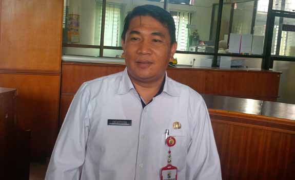 H Devitson SH MH Kepala BPMP2T Kabupaten Pelalawan